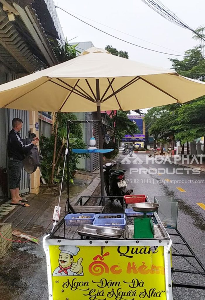 Ô dù chính tâm màu kem Hòa Phát kết hợp xe đẩy